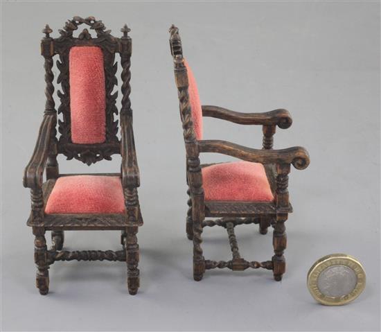Denis Hillman. A pair of Victorian style Carolean design miniature oak elbow chairs, height 4in.